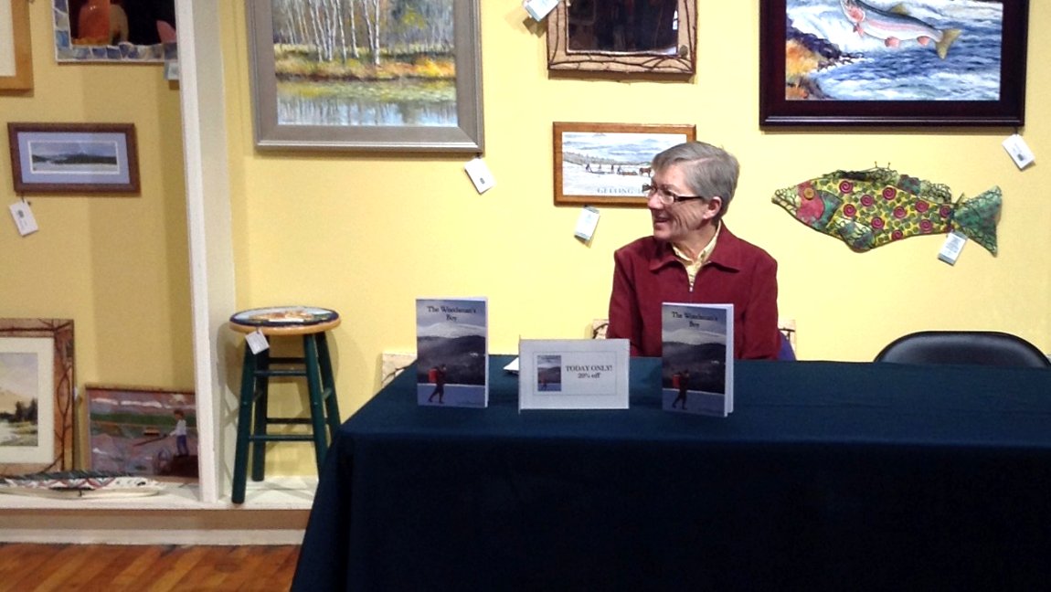 Author at table